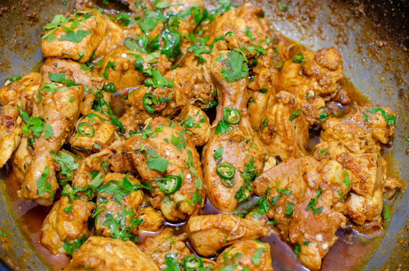 Chicken curry with fresh coriander and green chilli